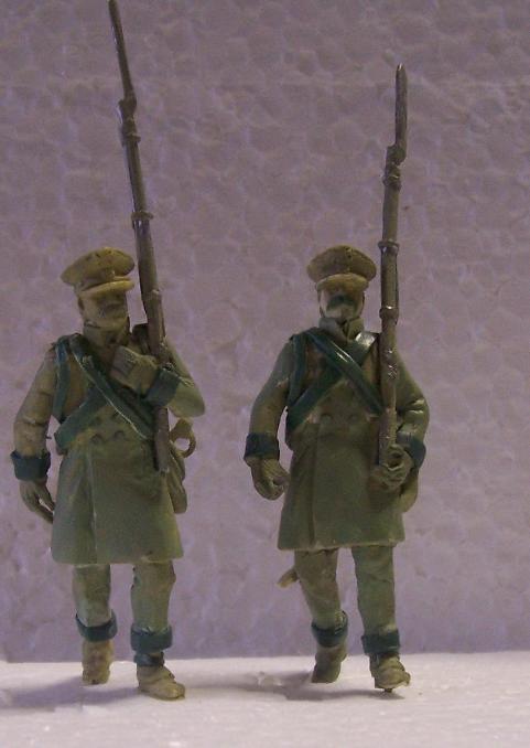 A picture of 2 original sculpted figures